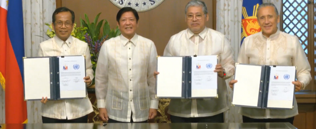 Officials from the UN and Government of the Philippines who signed the document